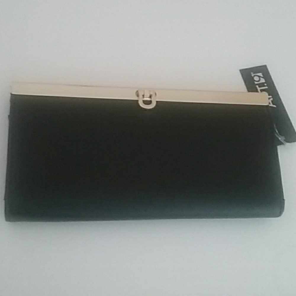Black clutch wallet with gold detail